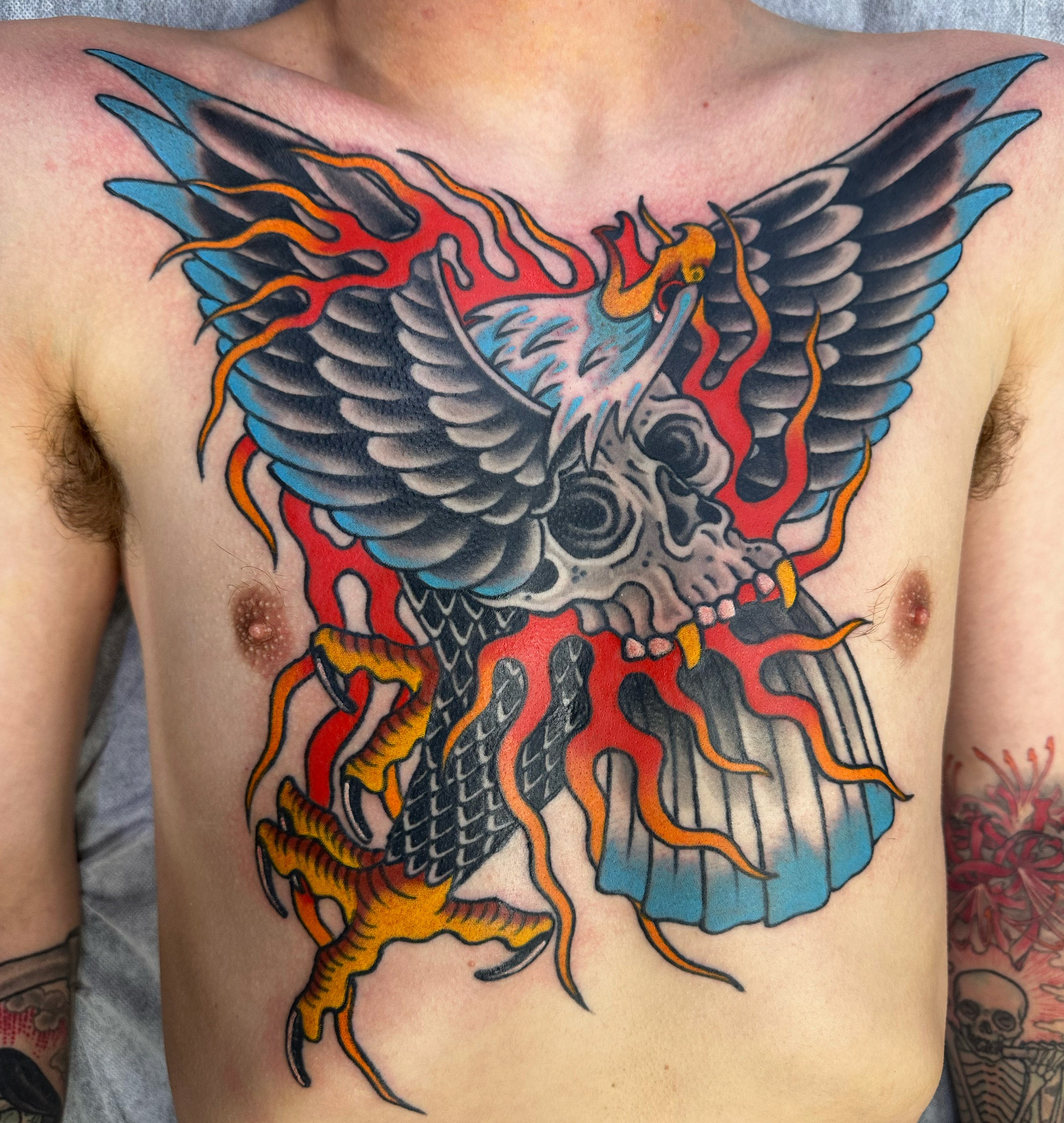 Traditional eagle and skull chest piece tattoo