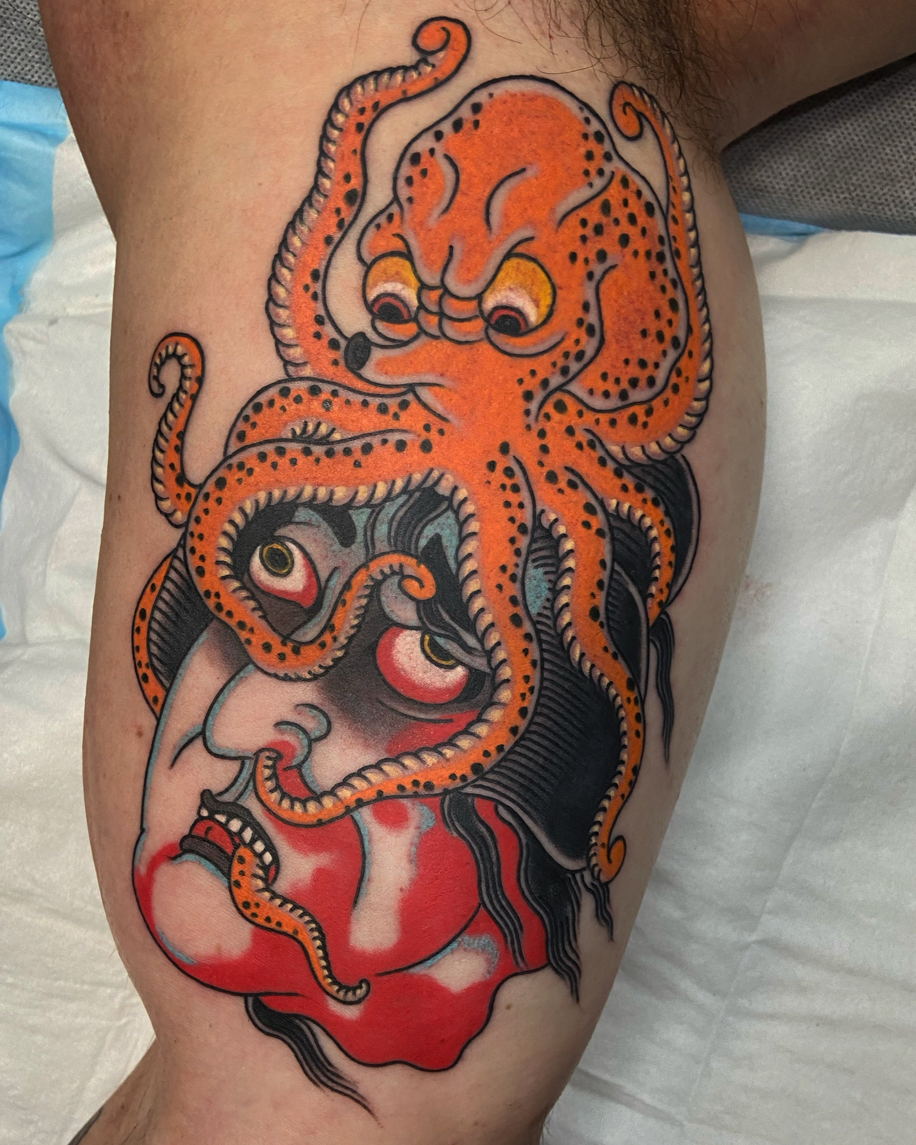 Namakubi with orange Japanese octopus on its head 