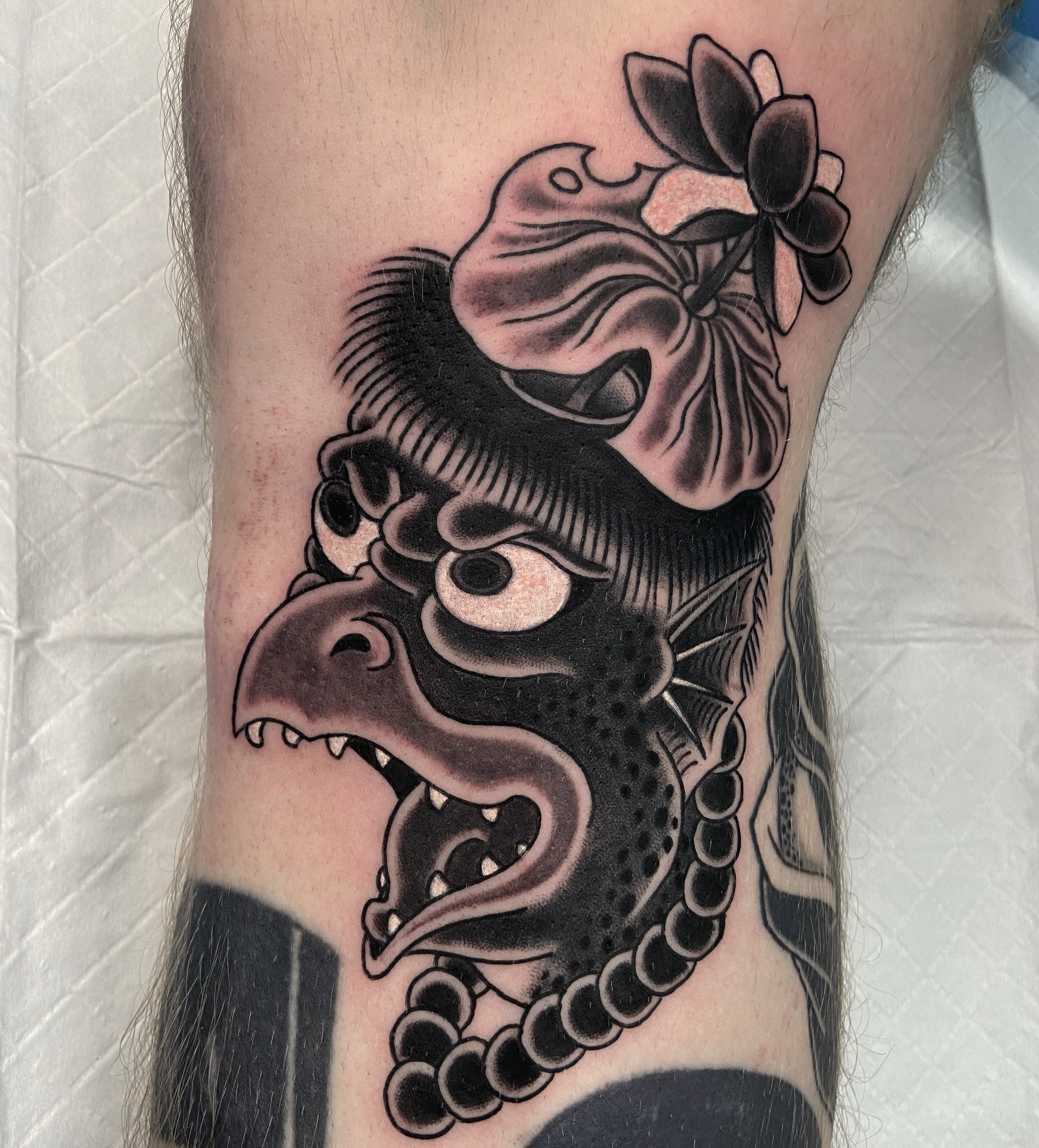 Japanese yokai kappa tattooed in black and grey