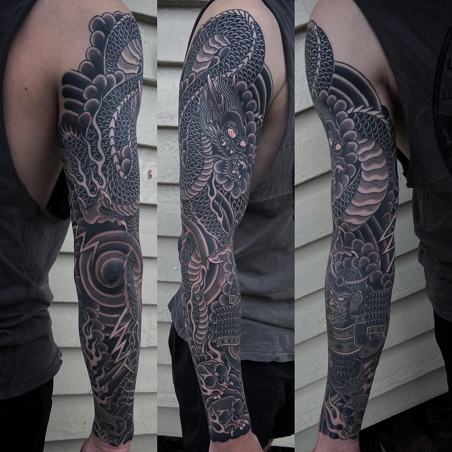 Black and grey Japanese dragon and samurai sleeve tattoo