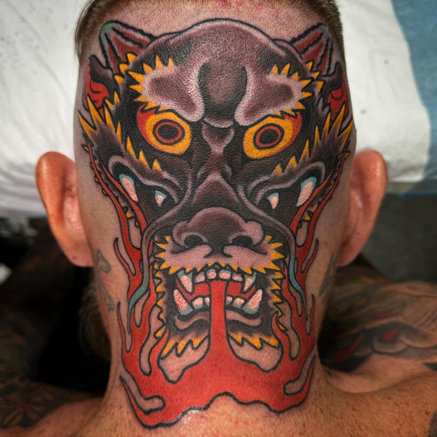 Japanese dragon tattoo on back of the head