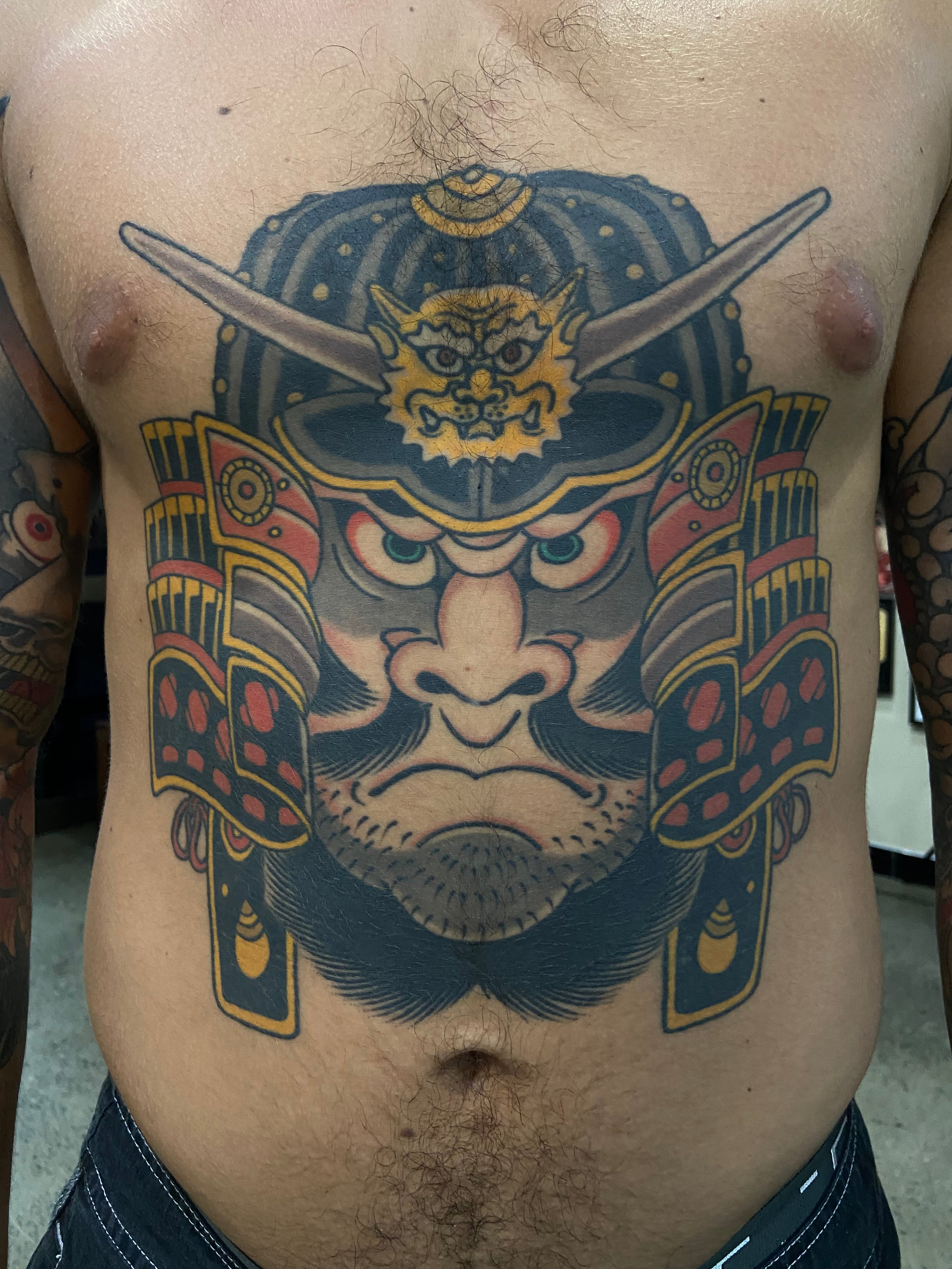 Healed traditional Japanese samurai stomach tattoo