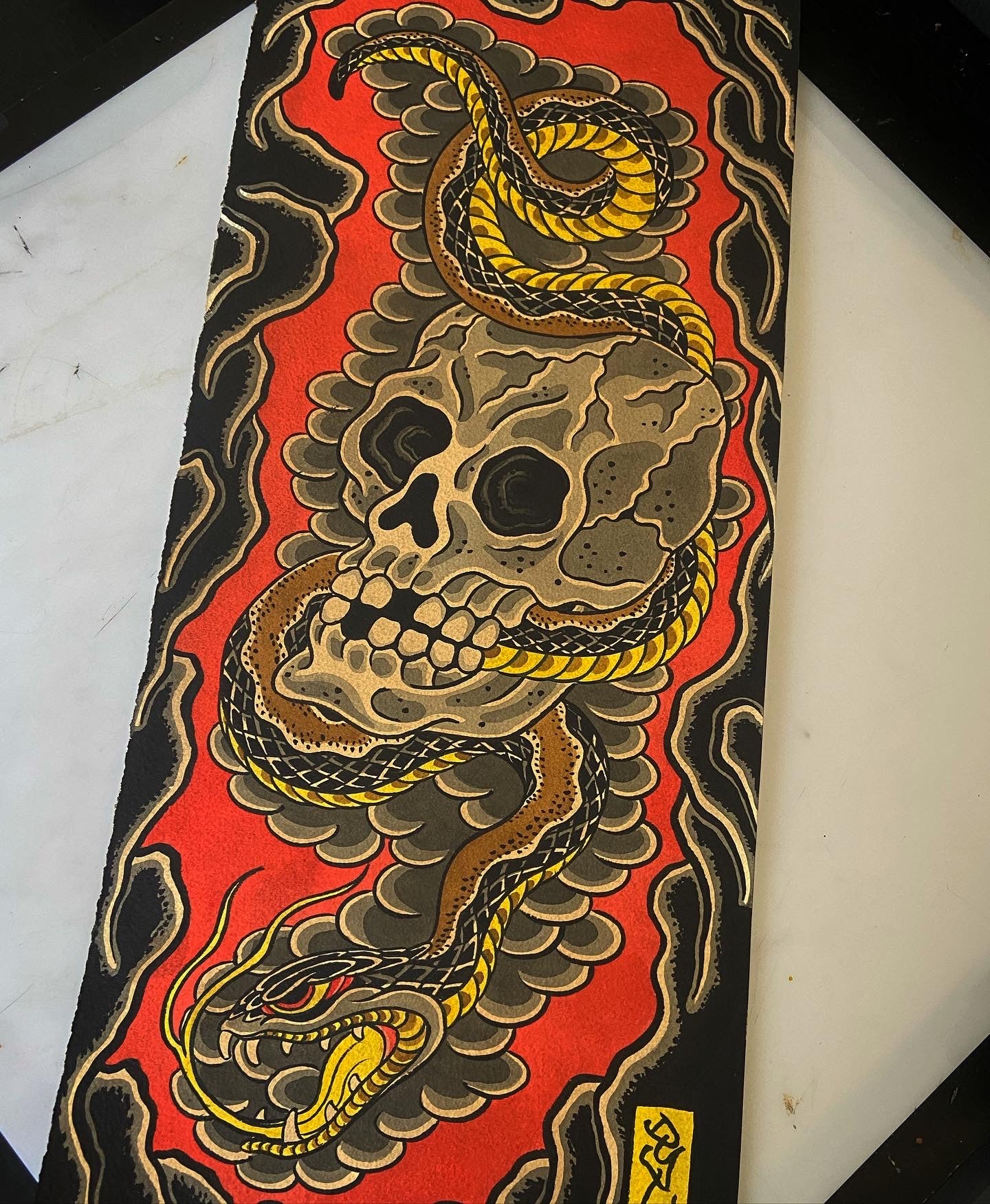 Traditional snake and skull tattoo design 